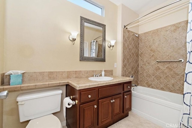 bathroom with vanity, toilet, shower / tub combo, and tile patterned flooring