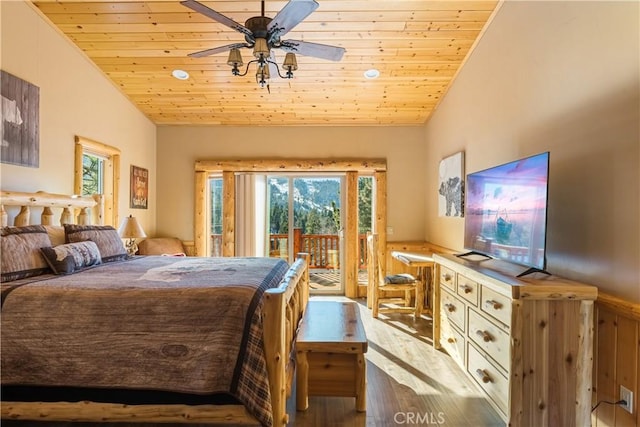 bedroom with vaulted ceiling, ceiling fan, wood ceiling, and access to outside