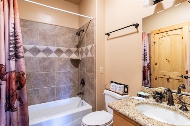 full bathroom with toilet, vanity, and shower / tub combo with curtain