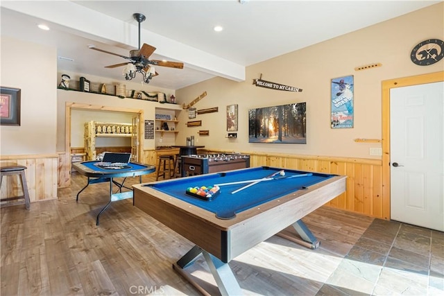 game room with ceiling fan, beamed ceiling, and pool table