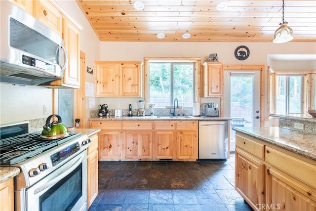 kitchen with sink, hanging light fixtures, appliances with stainless steel finishes, light brown cabinetry, and wooden ceiling