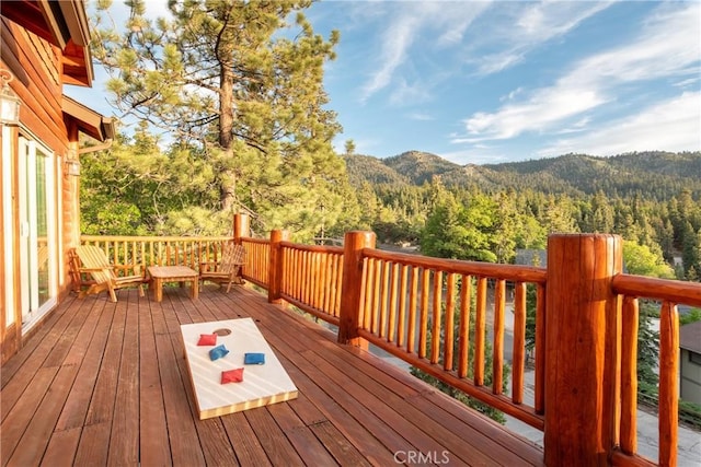 wooden terrace with a mountain view