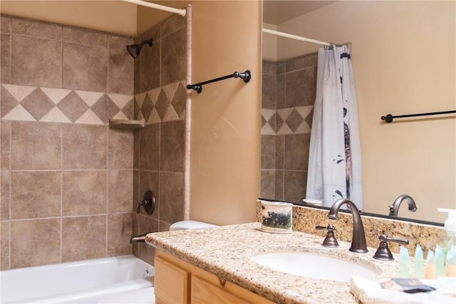 full bathroom featuring toilet, vanity, and shower / tub combo with curtain