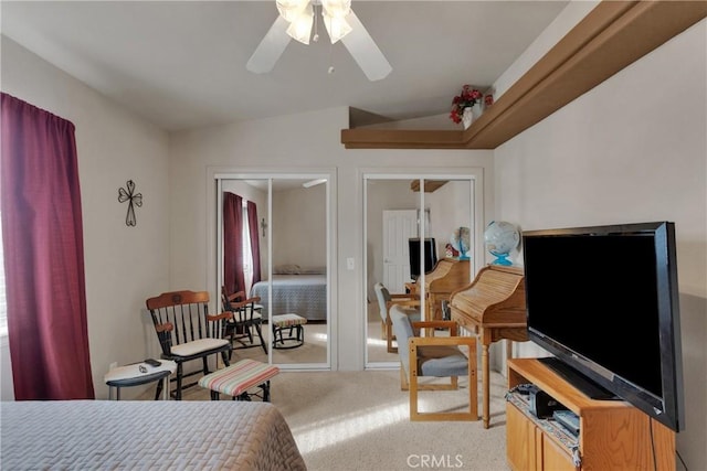 carpeted bedroom featuring ceiling fan and lofted ceiling