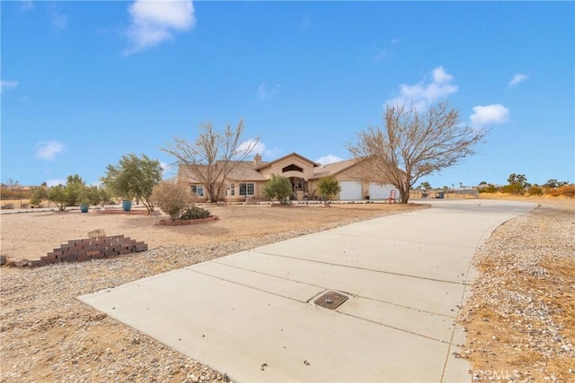 ranch-style home with a garage