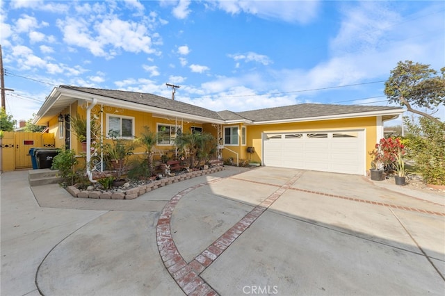 ranch-style home with a garage