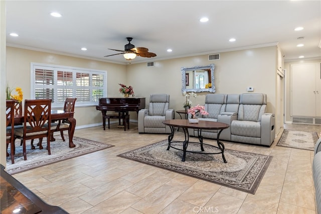 living room featuring ceiling fan and ornamental molding