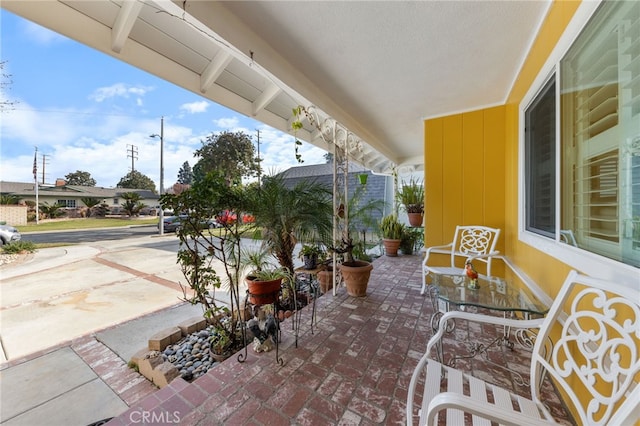 view of patio featuring covered porch