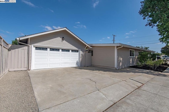 single story home featuring a garage