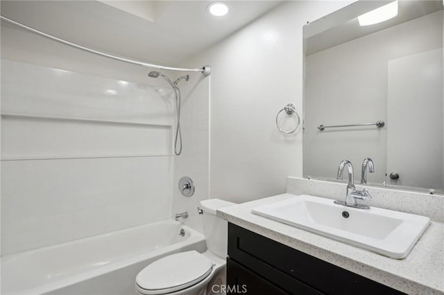 full bathroom with vanity, toilet, and shower / bath combination