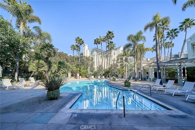 view of pool featuring a patio area