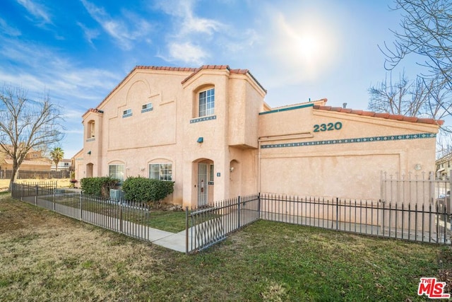 view of front of home with a front yard