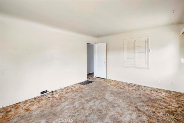 view of carpeted spare room