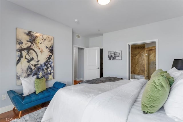 bedroom featuring hardwood / wood-style floors