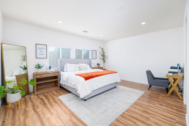 bedroom featuring light hardwood / wood-style floors