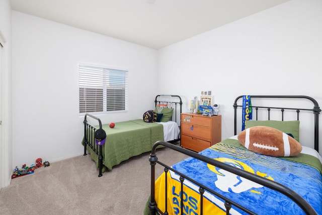 bedroom featuring carpet