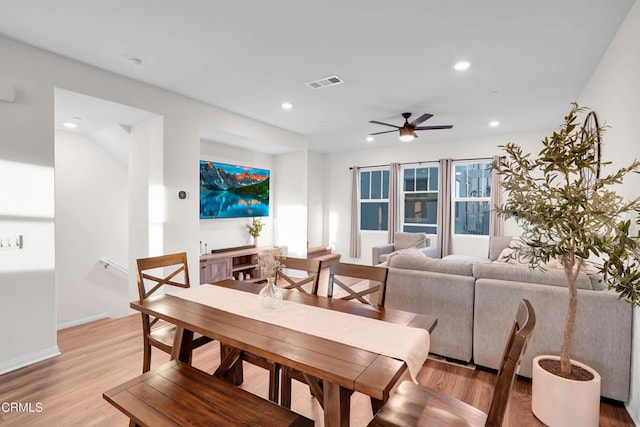 dining room featuring ceiling fan and light wood-type flooring