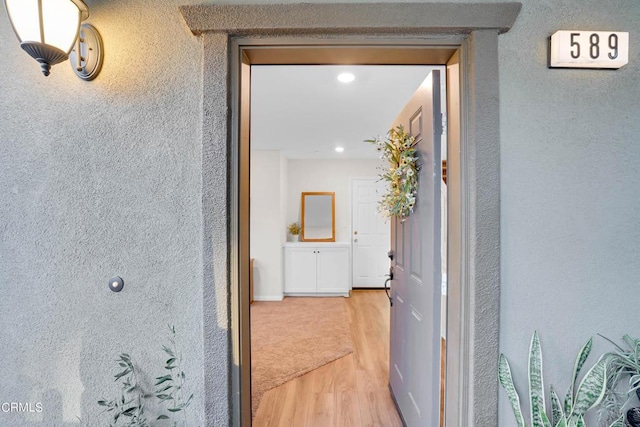 hall featuring hardwood / wood-style flooring