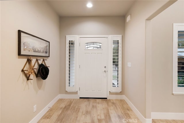 entrance foyer featuring light hardwood / wood-style floors