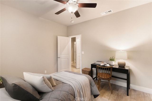 bedroom featuring ceiling fan and light wood-type flooring