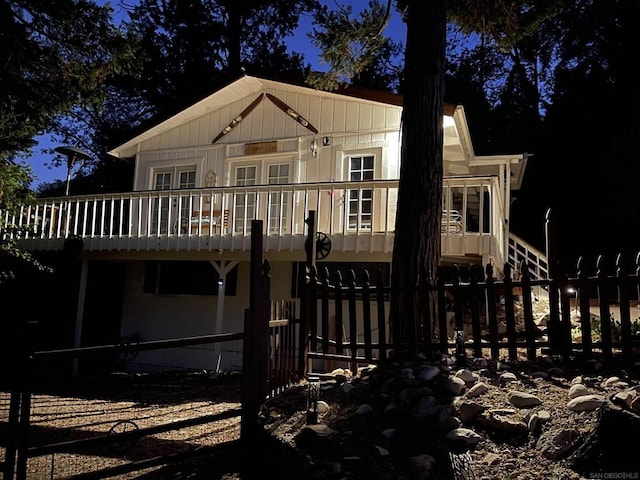 view of back house at night