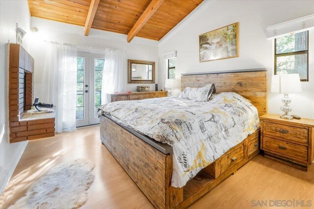 bedroom with wooden ceiling, vaulted ceiling with beams, light hardwood / wood-style flooring, and access to outside