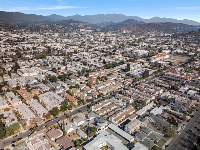 drone / aerial view featuring a mountain view