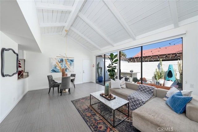 living room with beam ceiling, high vaulted ceiling, and wood ceiling