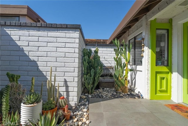 view of home's exterior with a patio area