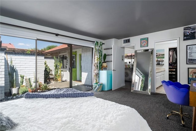 bedroom with dark carpet