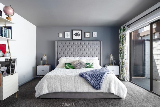 carpeted bedroom featuring access to outside