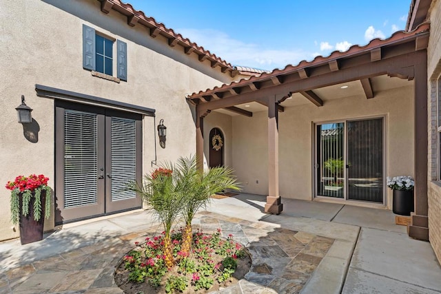 exterior space with french doors and a patio