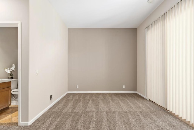 view of carpeted spare room