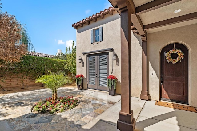 property entrance with french doors