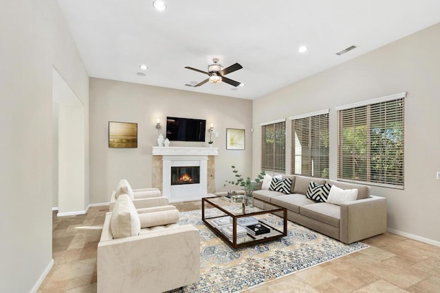 living room featuring ceiling fan