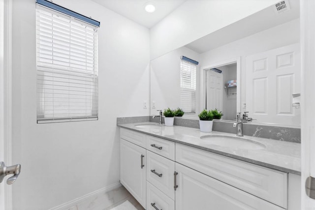 bathroom featuring vanity