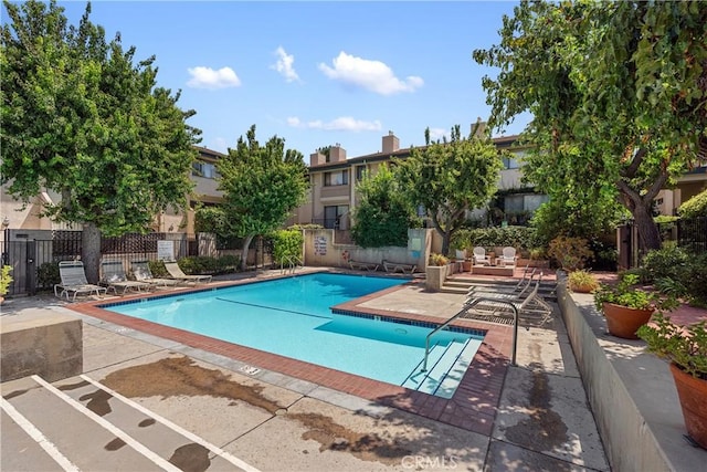 view of swimming pool featuring a patio