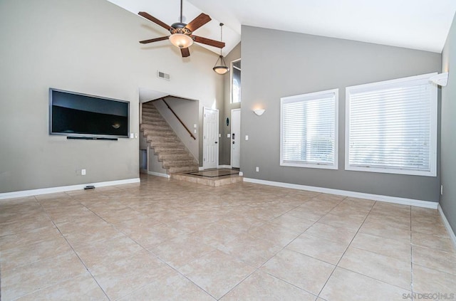 unfurnished living room featuring ceiling fan, light tile patterned floors, and high vaulted ceiling