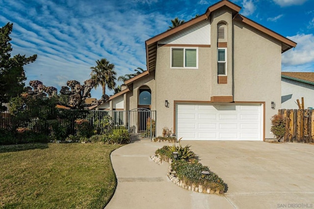 view of front of home with a garage and a front lawn