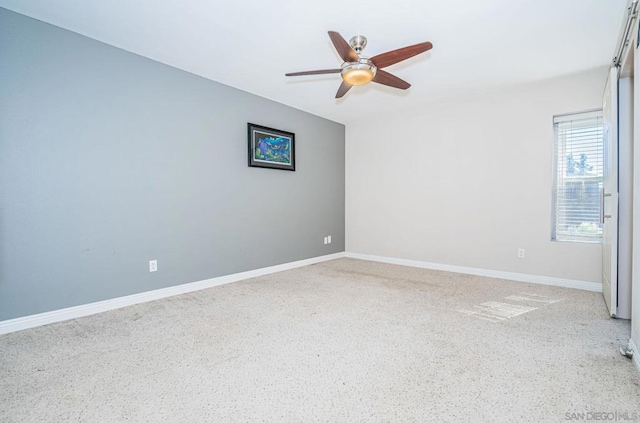 empty room featuring ceiling fan