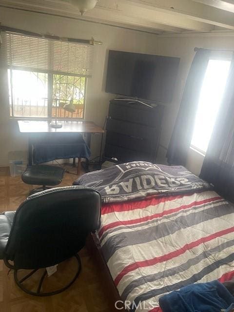 bedroom with parquet flooring