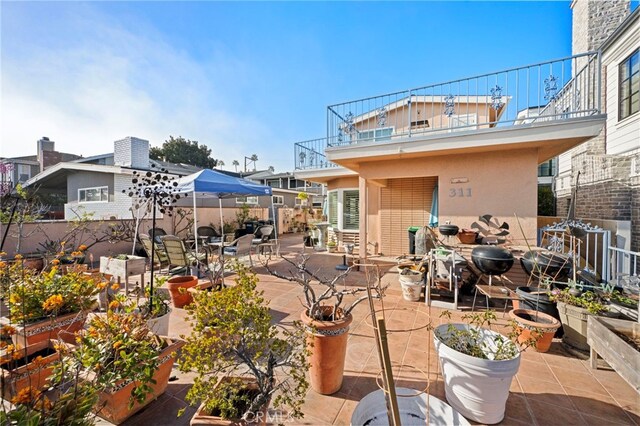 view of patio / terrace featuring a balcony