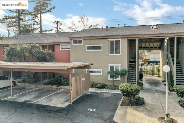 view of property featuring a carport