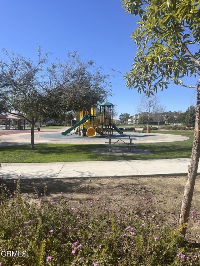 view of play area featuring a lawn