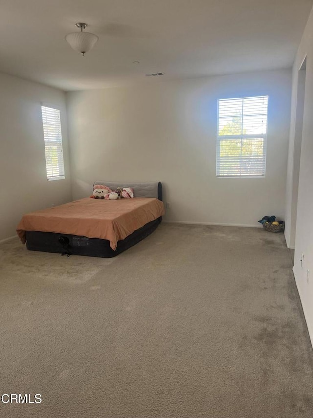 bedroom featuring carpet floors