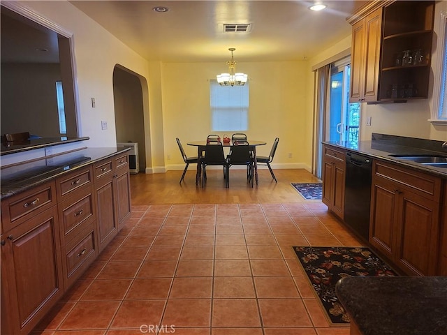 kitchen featuring dark countertops, black dishwasher, a sink, and open shelves