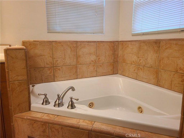 bathroom featuring a whirlpool tub