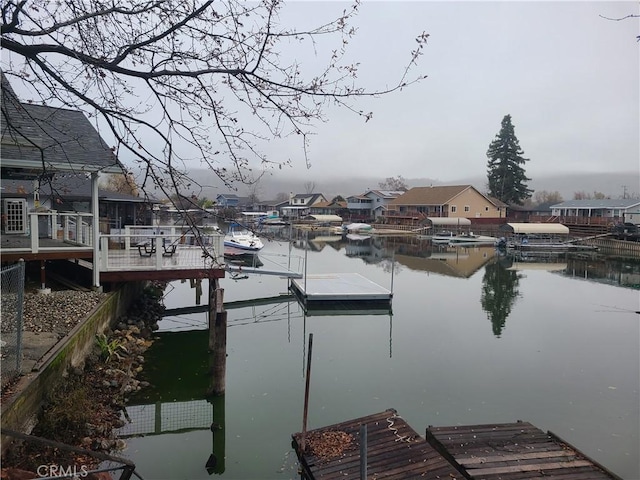 dock area with a water view