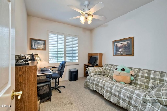 home office featuring ceiling fan and carpet