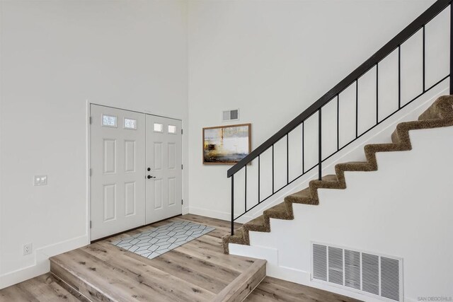 foyer with light hardwood / wood-style flooring